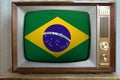 Old tube vintage TV with the national flag of Brazil on the screen, the concept of eternal values Ã¢â¬â¹Ã¢â¬â¹on television, global Royalty Free Stock Photo